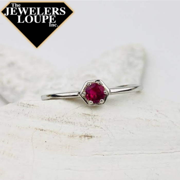 Sterling Silver Ring set with Faceted Small Lab Created Ruby