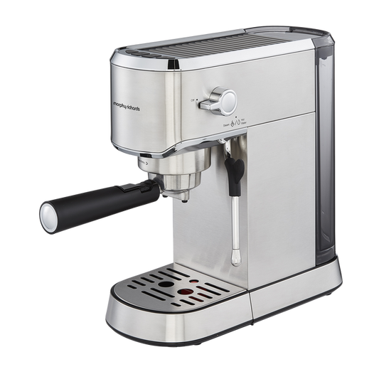 A stainless steel compact espresso coffee machine with a built-in milk frother and LED illuminated buttons, featuring a black handle and a detachable drip tray.