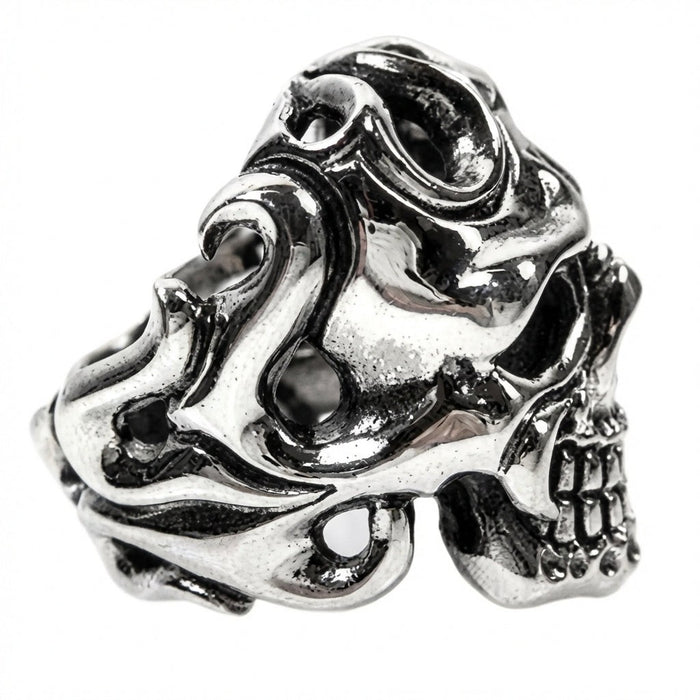 Profile view of heavyweight skull ring displaying dimensional tribal carving extending to band