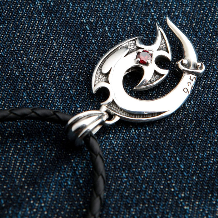 Tribal fish hook pendant in sterling silver showing 925 hallmark stamp on braided leather cord