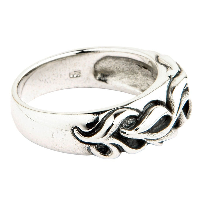 Side perspective showing the relief depth of the handcrafted silver carving