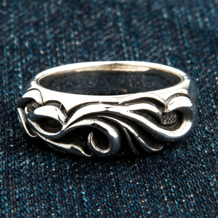 Front view of solid 925 sterling silver ring with deep tribal carving