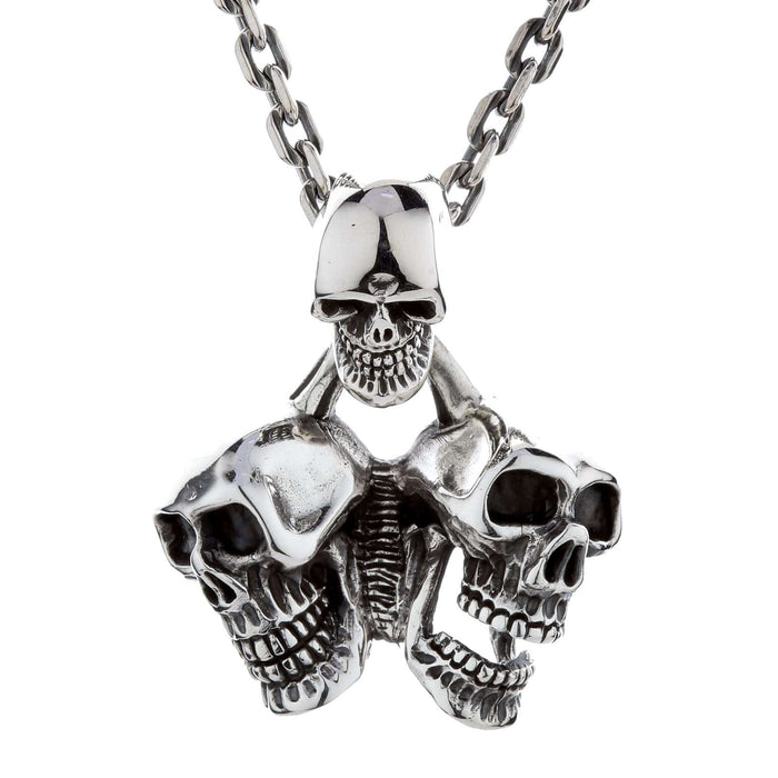 The heavy triple skull pendant shown on a sterling silver chain to represent it as a complete necklace.