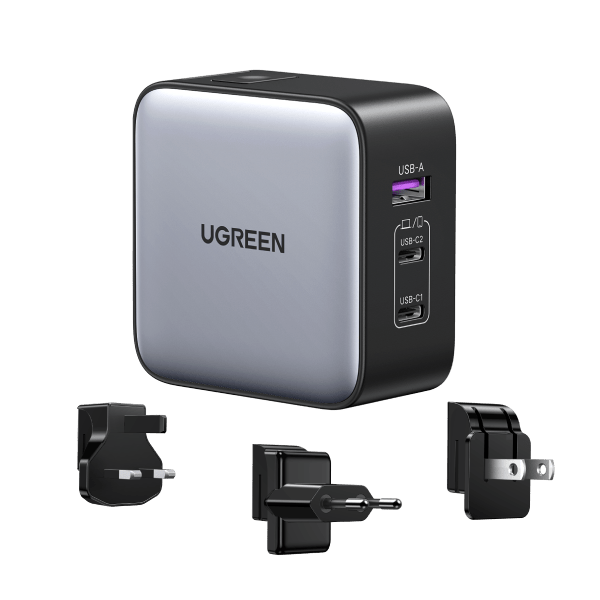 UGREEN 65W iphone charger with a sleek gray and black design, featuring a USB-A port and two USB-C ports (USB-C1 and USB-C2). Accompanied by three different types of plug adapters for international use.