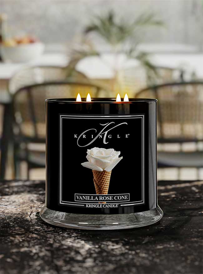 Vanilla Rose Cone 4-wick lit candle from Kringle Candle Reserve Collection on a granite kitchen counter