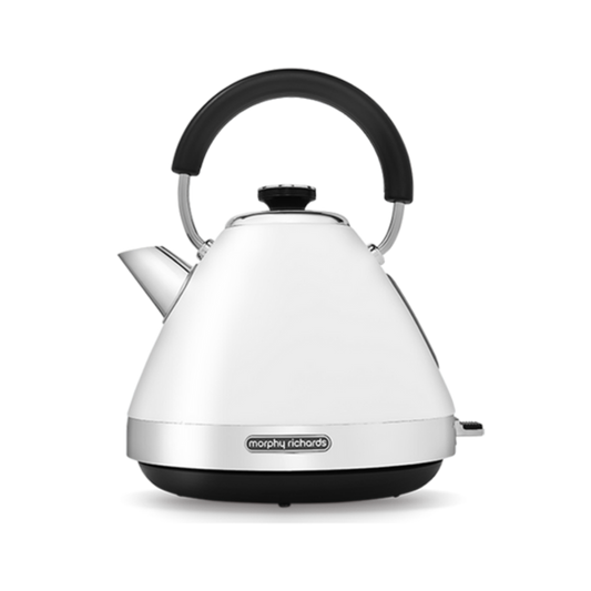 A white pyramid-shaped electric kettle with a black handle and base, displaying the brand name 'Morphy Richards' on the spout.