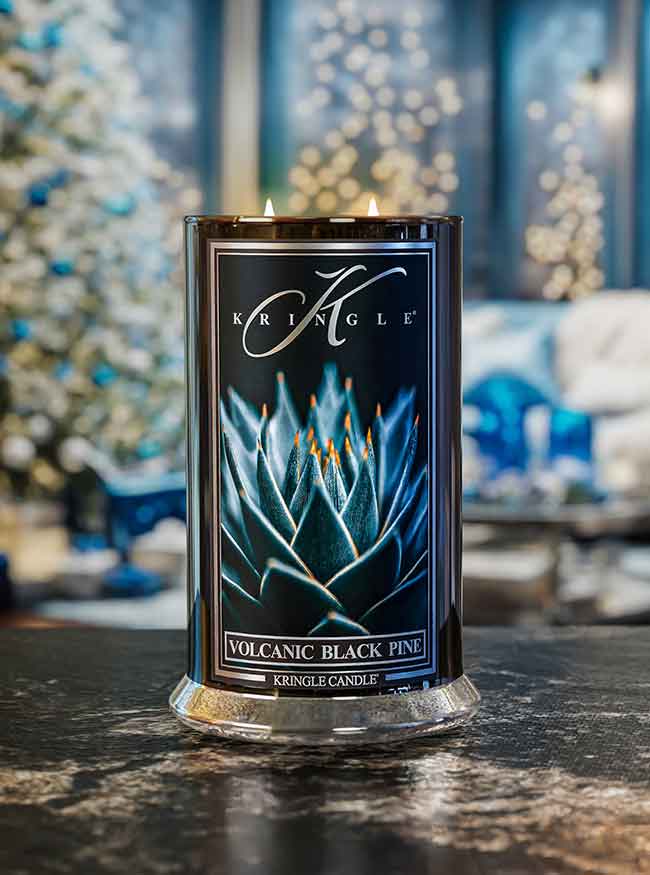 Large Volcanic Black Pine Scented Reserve Collection Lit Candle in holiday decorated home - Kringle Candle Company
