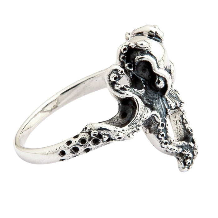 A view of the other side of the women's Kraken-style heart ring, with detailed texturing.