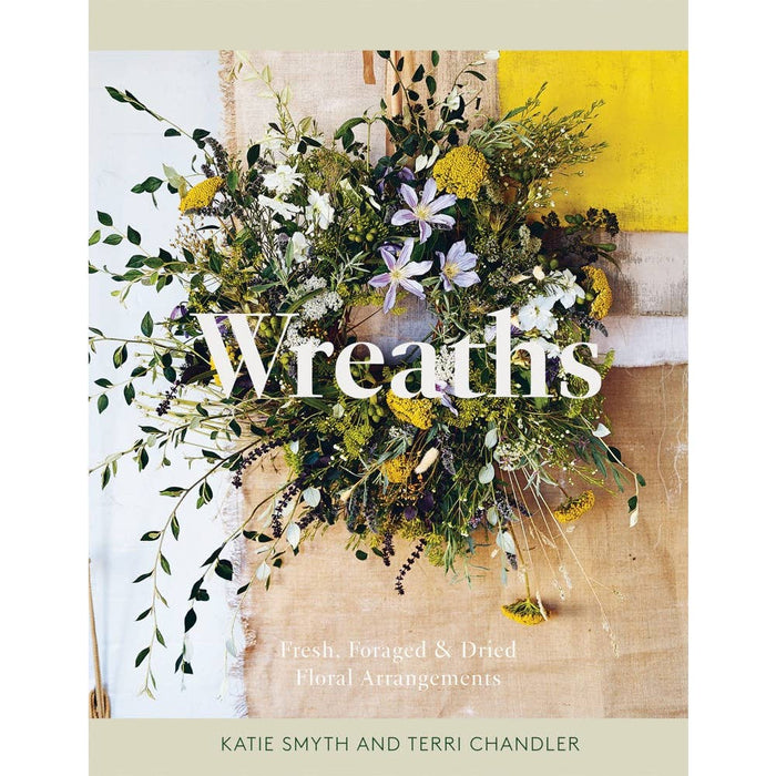 The cover of the 'Wreaths' hardcover book featuring a beautifully arranged floral wreath with a variety of greenery and flowers, set against a neutral background.