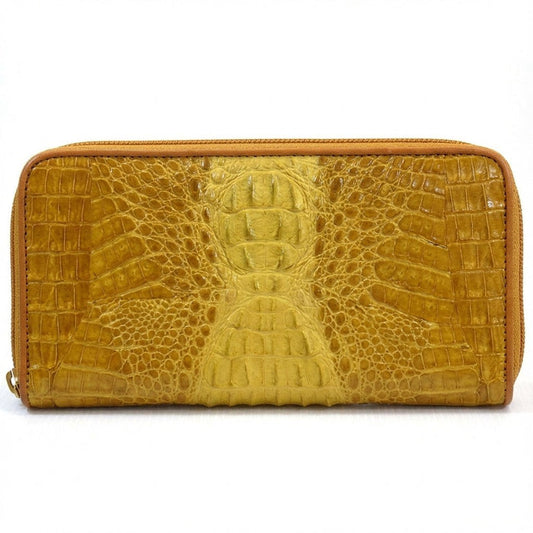 Exotic yellow crocodile wallet showing authentic hornback scale texture pattern